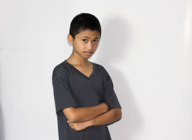 istock portrait Asian boy on isolated white background 1456337539