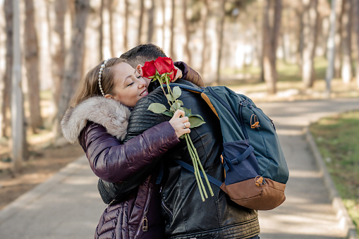 Young couple having a Romantic Reunion in the park