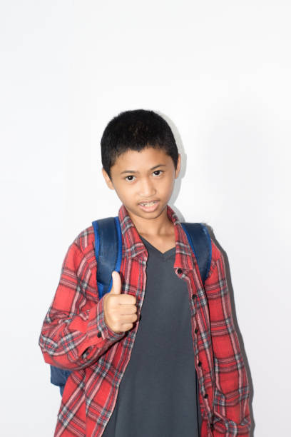 istock Asian boy wearing casual uniform school isolated on white background 1456341288