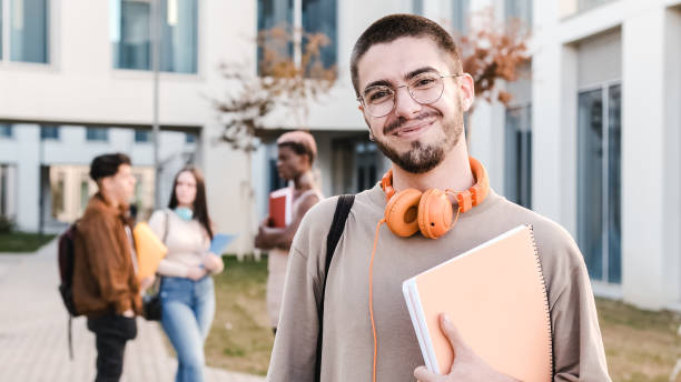 istock Happy caucasian student smiling to the camera 1456348226