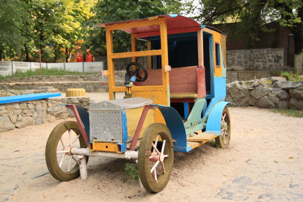 istock Old-fashioned car at the playground 1456349452