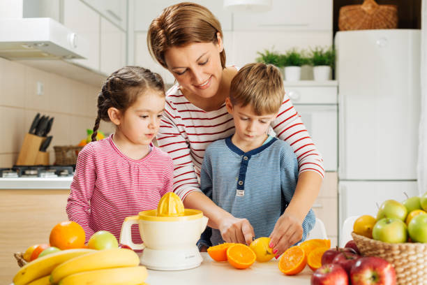 istock Family making healthy breakfast 1456352316