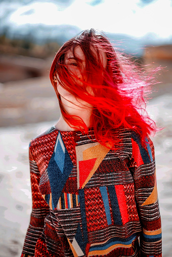 Colorful fashion, even hair color.