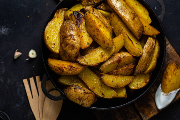 istock fried potatoes Rustic potato with garlic and spices 1456365200