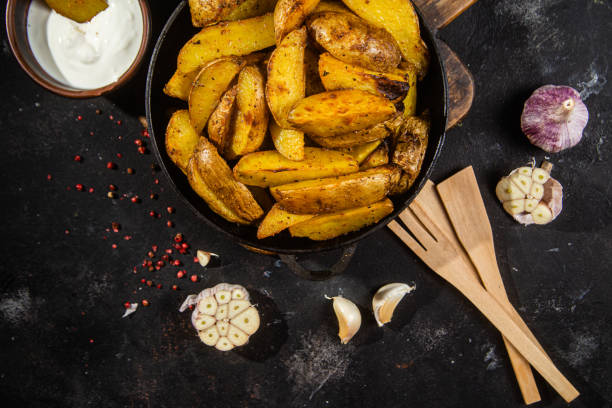 istock fried potatoes Rustic potato with garlic and spices 1456365241