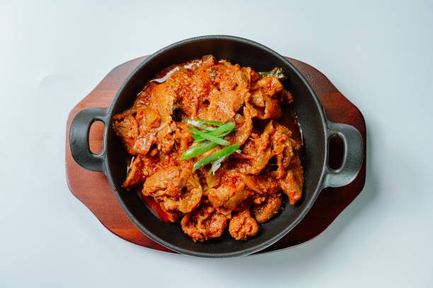 jeyukbokkeum, Korean style stir-fried pork : Thinly sliced pork marinated in spicy ginger-gochujang and stir-fried with onion, carrots, perilla leaves, or abbage. Ingredients vary according to taste.
