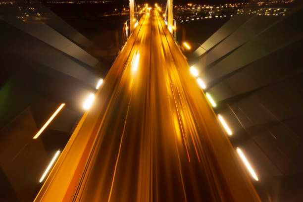 istock abstract blurred background of highway at night 1456373135