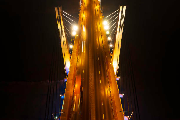 istock abstract blurred background of highway at night 1456373154