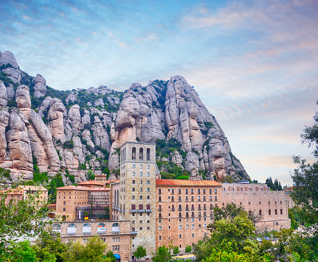 Santa Maria de Montserrat is a Benedictine abbey located on the mountains near Barcelona, Spain. Composite photo