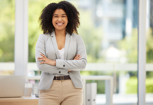 Business, confidence and portrait of happy black woman, worker or employee with pride in marketing career success. Women empowerment, corporate happiness or office girl satisfied with advertising job