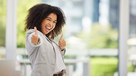 Business thumbs up, happy and black woman excited with high energy, crazy and thumbsup for marketing success or growth. Yes, corporate motivation and young employee with emoji hands sign for good job