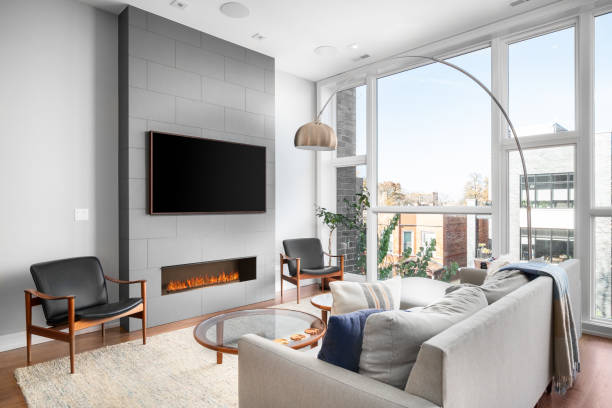 istock A modern living room with a television over the fireplace. 1456385491