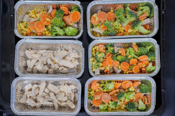 istock Raw chicken breast with vegetables in baking tray ready for oven 1456386451