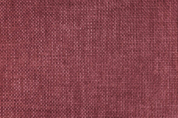 istock Jacquard woven upholstery, red coarse fabric texture close up 1456386806