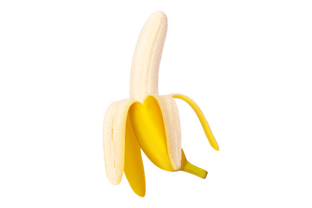 istock Fresh raw yellow banana peeled open in flight isolated. 1456386847