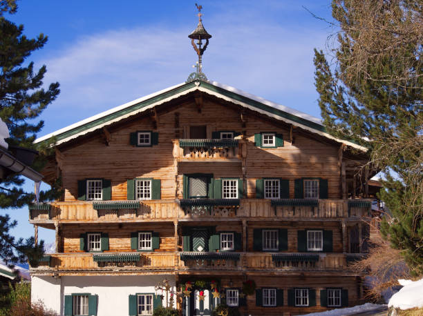 Kitzbuhel, Austria - December 17, 2021: Beautiful alpine building of Aurach wildpark during afternoon hours in Christmas.
