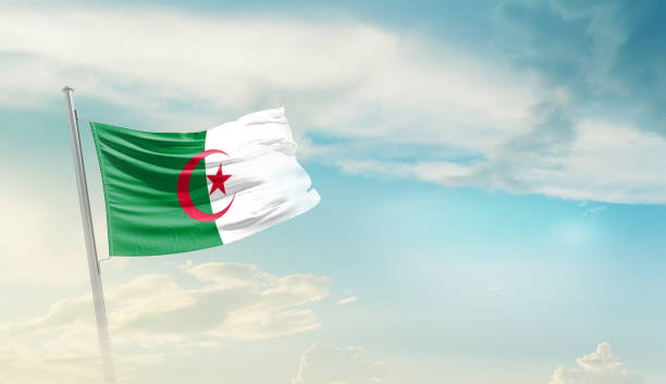 istock Algeria waving flag in beautiful sky. 1456387655