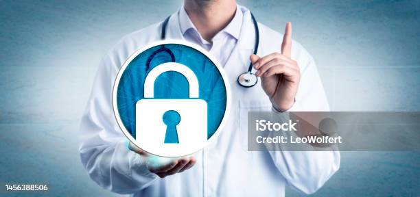 Cardiologist Demanding Cybersecurity And Privacy Stock Photo - Download Image Now - Healthcare And Medicine, Privacy, Doctor