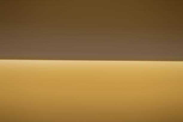 istock Blurred streaks of brown and gold. 1456390666