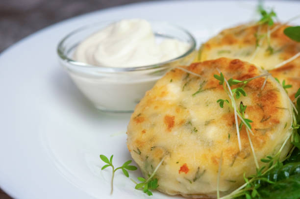 istock Cheese pancakes with sour cream. 1456392071