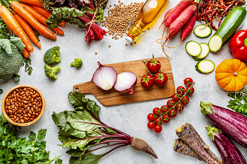 Overhead view of fresh healthy organoic vegetables background. High resolution 42Mp studio digital capture taken with SONY A7rII and Zeiss Batis 40mm F2.0 CF lens