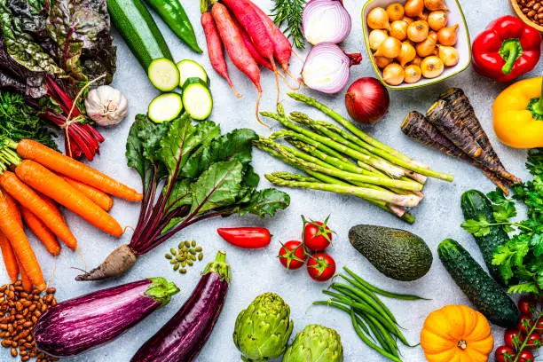 Overhead view of fresh healthy organic vegetables background. High resolution 42Mp studio digital capture taken with SONY A7rII and Zeiss Batis 40mm F2.0 CF lens