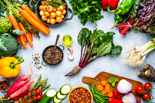 Overhead view of fresh healthy organic vegetables background. High resolution 42Mp studio digital capture taken with SONY A7rII and Zeiss Batis 40mm F2.0 CF lens