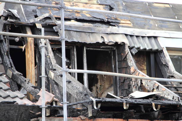 istock a charred window in a burned house 1456405014