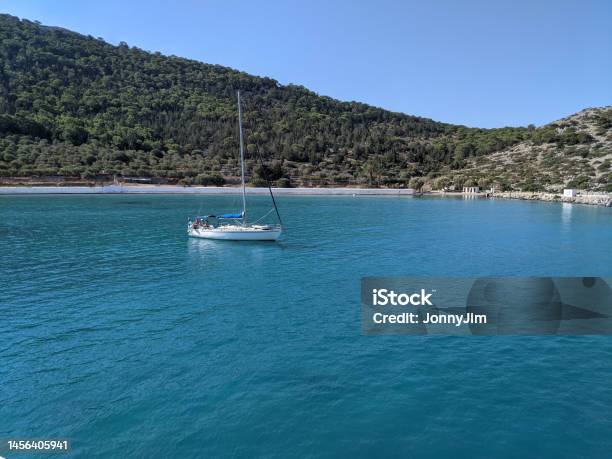 Yacht At Anchor In Bay Stock Photo - Download Image Now - Aegean Islands, Aegean Sea, Anchored