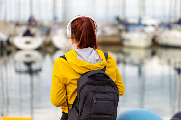 istock Active young red-haired woman in the marina 1456414666