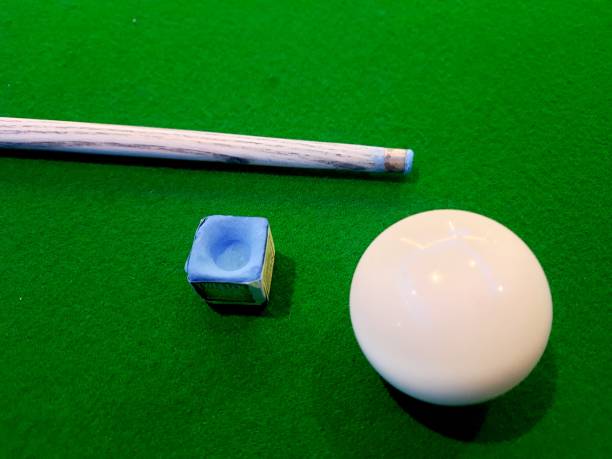 istock Cue stick , cue ball , a pool or snooker table . 1456416186