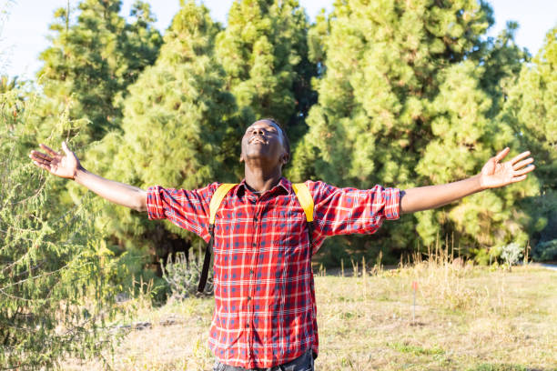 istock Happy African man with open arms. 1456419398