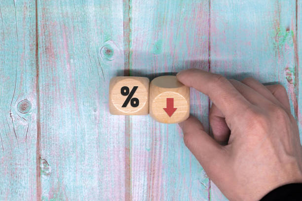 istock a declining trend in interest rates It symbolizes that interest rates are falling or vice versa. a business concept make a copy of a blank 1456424746