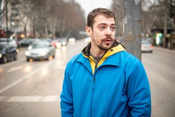 istock Caucasian guy walking on the street 1456426017