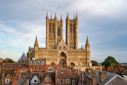 Architectural detail on the tower of Gloucester cathedral in spring sunshine, Gloucestershire, UK