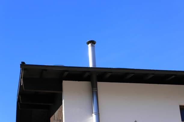 stainless steel chimney new stainless steel chimney on a house vent stack stock pictures, royalty-free photos & images