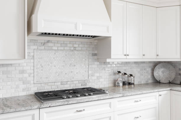 istock A kitchen stovetop and hood with off white cabinets. 1456429466