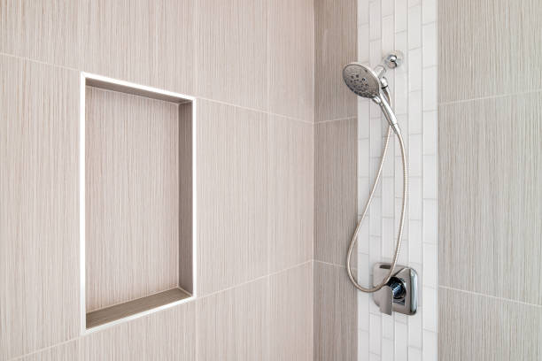 istock A shower with brown and white tiles. 1456430171