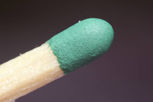 Closeup match on a white background with clipping path.matchstick flat lay,copy space,selective focus.Studio shot.