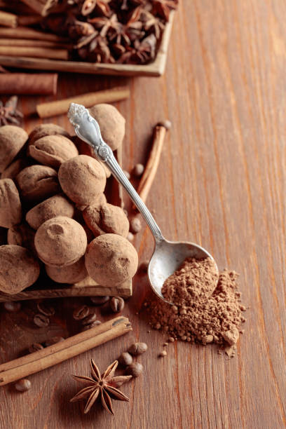 istock Chocolate truffles on a wooden table. 1456434308