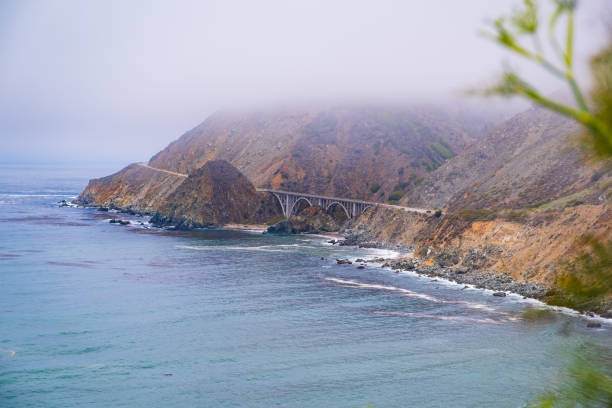 Big Creek Bridge south of Big Sur on Highway 1 on a foggy morning.