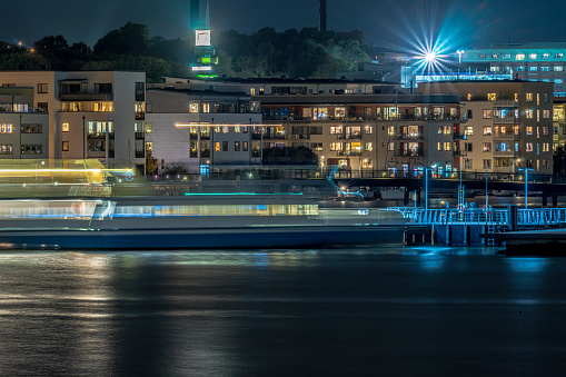 Trollhättan, Sweden - October 09 2022: Ferry ─lvsnabben departing Slottsberget at night.