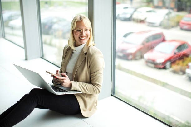 istock Female student typing on a laptop 1456437474