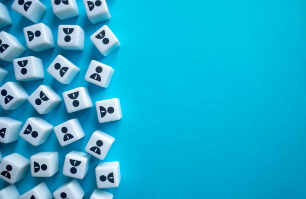 istock Lots of workers symbols on blocks on a blue background. 1456438332