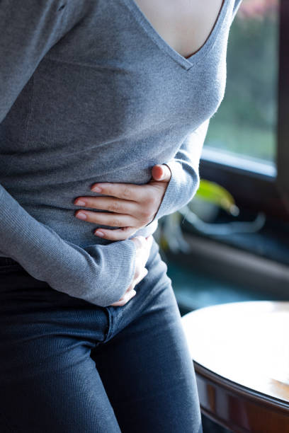 istock Woman with menstrual pain 1456439385