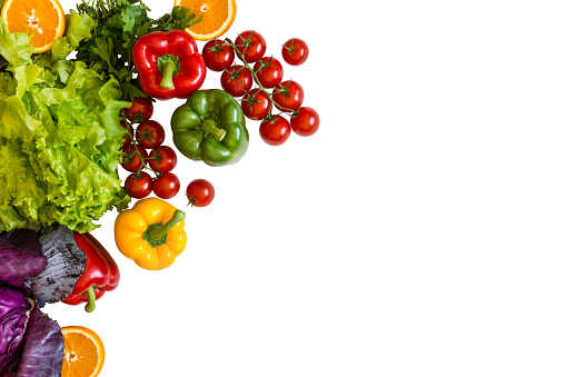 Fresh colorful organic vegetables on a white background, farming and healthy food concept copy space flat lay.