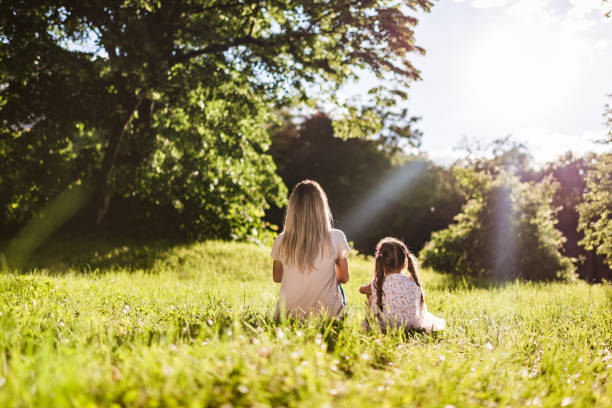 istock Beautiful mother and daughter enjoying nature 1456447228
