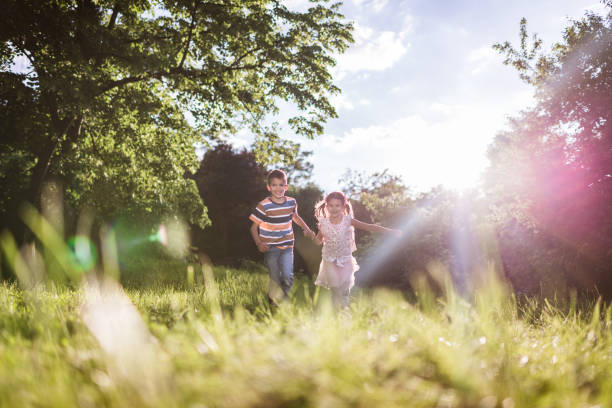istock Beautiful children running in nature 1456447347