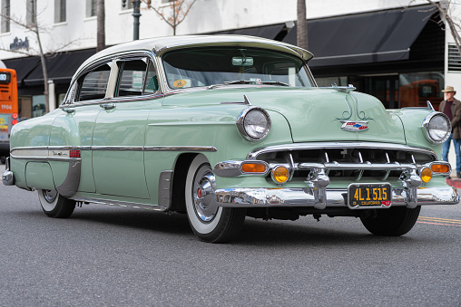 Pasadena, California, United States: early 1950sChevrolet Two-door Sedan vintage car shown cruising on Colorado Boulevard in the City of Pasadena on New Year's Day.