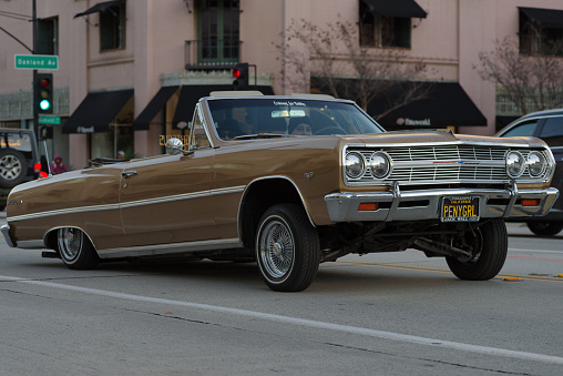 Pasadena, California, United States: classic Chevrolet turned lowrider shown on Colorado Boulevard in the City of Pasadena on New Year's Day.